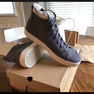 Tom’s high top sneakers